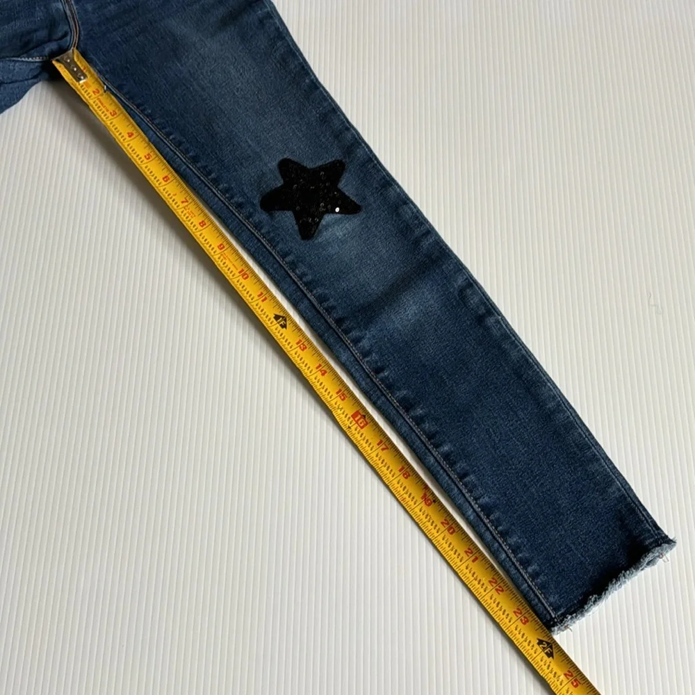Old Navy Rockstar Jeggings with black sequins star patch.  Girls size 10